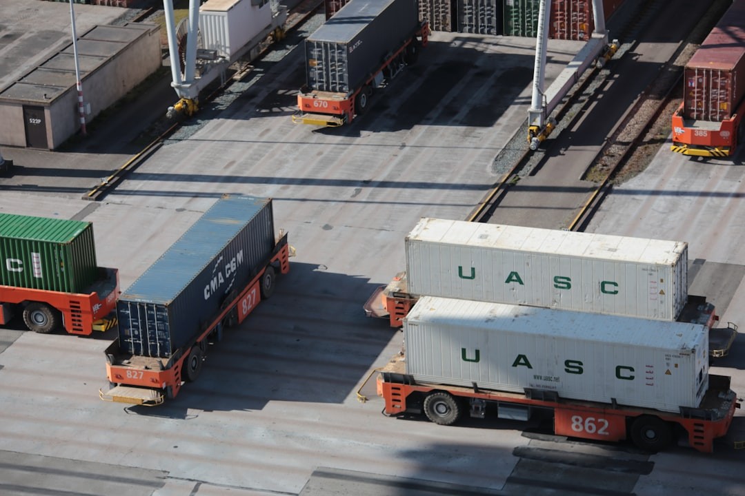 Automated Guided Vehicles carrying containers at Port of Rotterdam